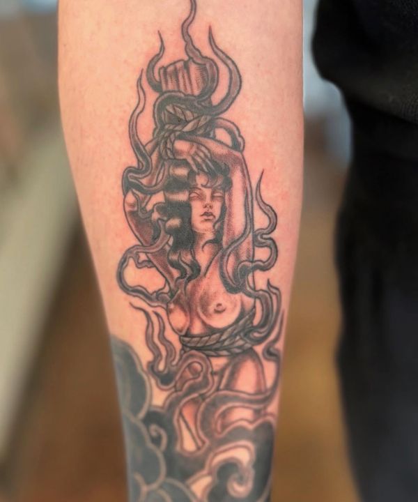 gabriella tattoo woman tied to stake