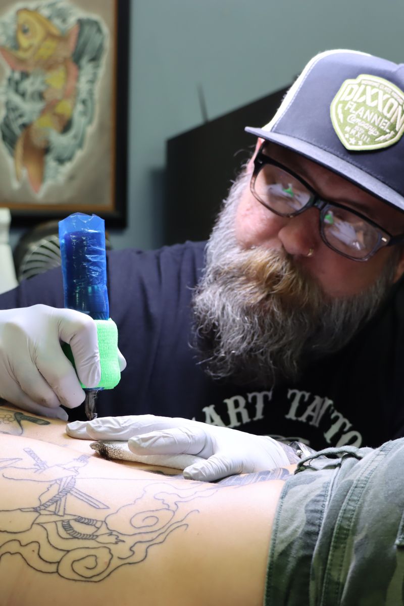 tattoo artist raymond